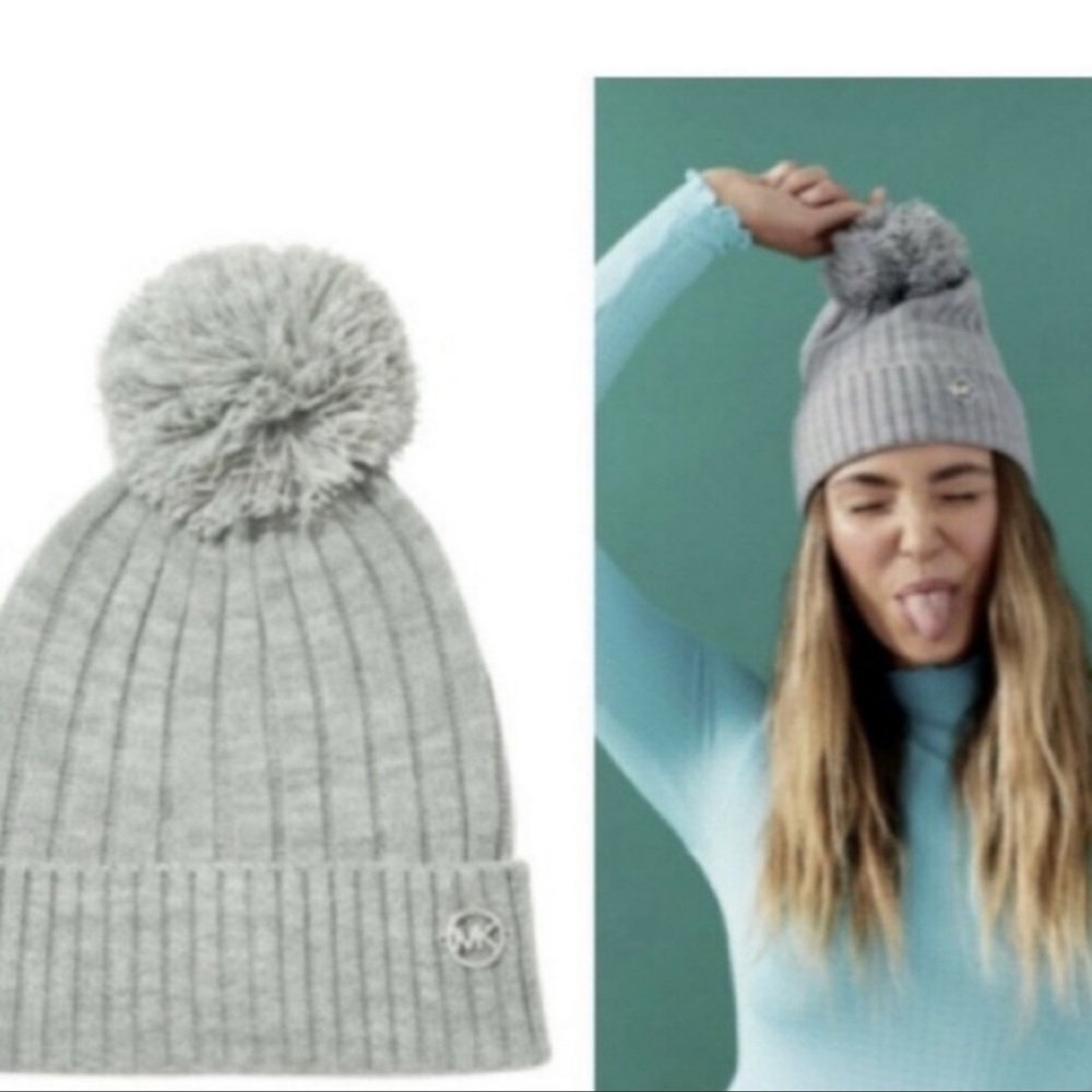 Michael Kors gray winter beanie with pom pom. Stylish, fun, warm, fun. NWT.